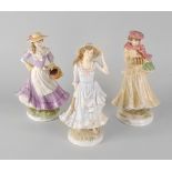 Three Royal Worcester figures, comprising 'Summer' (208/7500), 'Autumn' (298/7500) and 'Winter' (