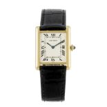 CARTIER - a Tank wrist watch. Numbered 960656271. Signed manual wind calibre 21. Silvered dial