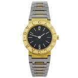 BULGARI - a lady's Bulgari bracelet watch. Stamped 18K with poincon. Reference 4891, serial A