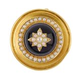 A late 19th century gold amethyst and split pearl sentimental brooch. The split pearl star, atop a
