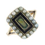 A split pearl and enamel memorial ring. The Georgian split pearl and black enamel panel, with