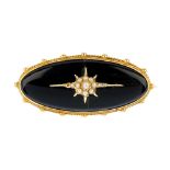 A mid 19th century 18ct gold split pearl memorial brooch. Of oval outline, the possible later