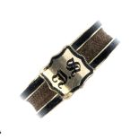 A mid Victorian gold mourning ring. The central initial panel to the woven hair central band with