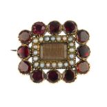 A late 19th century gold garnet and split pearl memorial brooch. The rectangular-shape vacant panel,