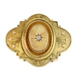 A late 19th century 15ct gold diamond memorial brooch. The oval-shape panel, inset with an old-cut