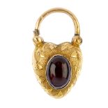 A mid 19th century 18ct gold garnet padlock clasp. The oval garnet cabochon collet, set atop the