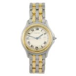 CARTIER - a Cougar bracelet watch. Stainless steel case with yellow metal bezel. Reference 187904,