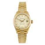 ROLEX - a lady's Oyster Perpetual Datejust bracelet watch. Circa 1987. 18ct yellow gold case with