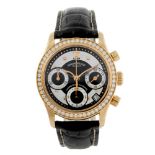 ARMAND NICOLET - lady's Tramelan chronograph wrist watch. 18ct rose gold case with exhibition case