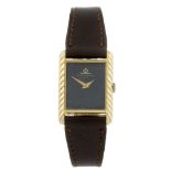 BAUME & MERCIER - a lady's wrist watch. Yellow metal case, stamped 18k with poincon. Reference