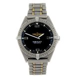 BREITLING - a gentleman's Professional Aerospace bracelet watch. Titanium case with calibrated