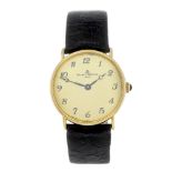 BAUME & MERCIER - a gentleman's wrist watch. Yellow metal case, stamped 18K 0,750 with poincon.
