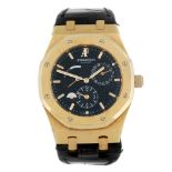 CURRENT MODEL: AUDEMARS PIGUET - a gentleman's Royal Oak Dual Time wrist watch. 18ct rose gold case.