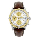 BREITLING - a gentleman's Chronomat chronograph wrist watch. Stainless steel case with yellow