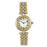 CARTIER - a Panthere Ronde bracelet watch. Stainless steel case with yellow metal bezel. Numbered