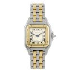 CARTIER - a Panthere bracelet watch. Stainless steel case with yellow metal bezel. Reference 112 000