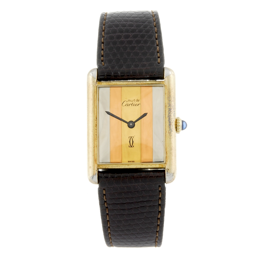 CARTIER - a Must De Cartier Tank wrist watch. Gold plated silver case. Numbered 6 148090. Signed