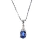 A sapphire and diamond pendant. The oval-shape sapphire, to the brilliant-cut diamond trefoil and