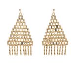 A pair of ear pendants. Each designed as an articulated triangular-shape panel with fringe detail.