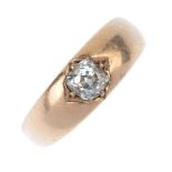 A late Victorian 18ct gold diamond single-stone ring. The old-cut diamond, inset to the tapered