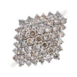 A 9ct gold diamond cluster ring. Of marquise-shape outline, the brilliant-cut diamond stepped panel,