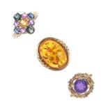 A selection of three 9ct gold gem-set rings. To include a 1970s amethyst single-stone ring with