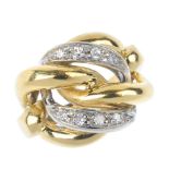 A diamond dress ring. The curved curb-link panel, with single-cut diamond link highlight, to the