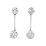 A pair of 18ct gold diamond cluster ear pendants. Each designed as a brilliant-cut diamond