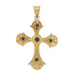 A sapphire cross pendant. The circular sapphire cabochon collet and disc centre, to the tapered arms