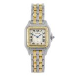 CARTIER - a Panthere bracelet watch. Stainless steel case with yellow metal bezel. Numbered