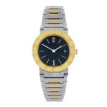 BULGARI - a lady's Bulgari bracelet watch. Stainless steel case with yellow metal bezel. Reference