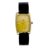 BAUME & MERCIER - a gentleman's wrist watch. Yellow metal case, stamped 18K 0,750 with poincon.