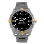 BREITLING - a gentleman's Professional Aerospace bracelet watch. Titanium case with calibrated