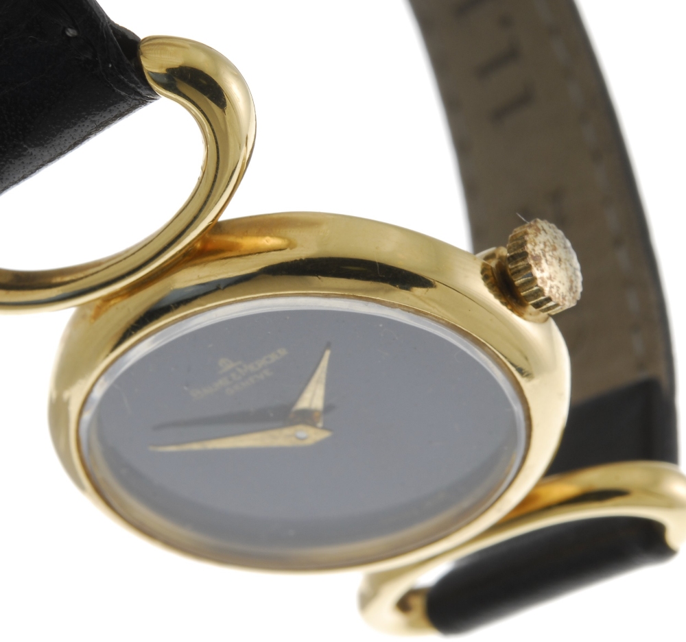 BAUME & MERCIER - a lady's wrist watch. Yellow metal case, stamped 750 with poincon. Unsigned manual - Image 3 of 4