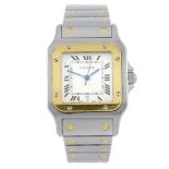 CARTIER - a Santos bracelet watch. Stainless steel case with yellow metal bezel. Reference 1566,