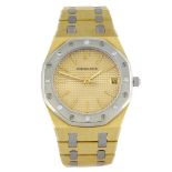 AUDEMARS PIGUET - a gentleman's Royal Oak bracelet watch. Yellow metal case with white metal case