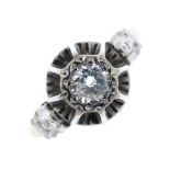 An 18ct gold diamond single-stone ring. The brilliant-cut diamond, within an illusion mount, to