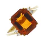 A citrine and diamond dress ring. The rectangular-shape citrine, to the brilliant-cut diamond-