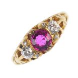 An early 20th century 18ct gold synthetic ruby and diamond three-stone ring. The circular-shape