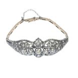 An early 20th century continental silver and gold diamond bracelet. Comprising five graduated old-