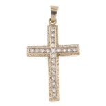 A cross pendant. designed as a series of circular-shape colourless paste, with scrolling sides and