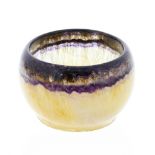 A Blue John bowl Of hemispherical form with parallel rim banding over a body of  'vaseline' hue,