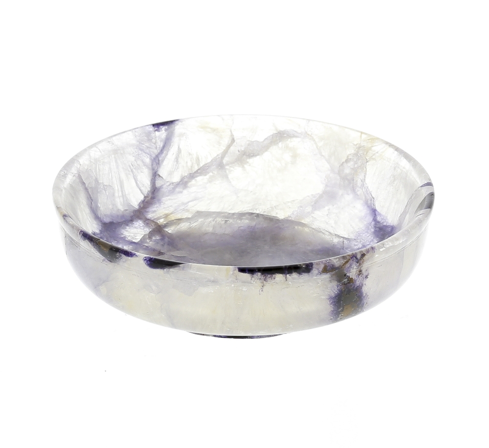 A Blue John bowl Of footed squat circular form, with intermittent dark rim patches and violet