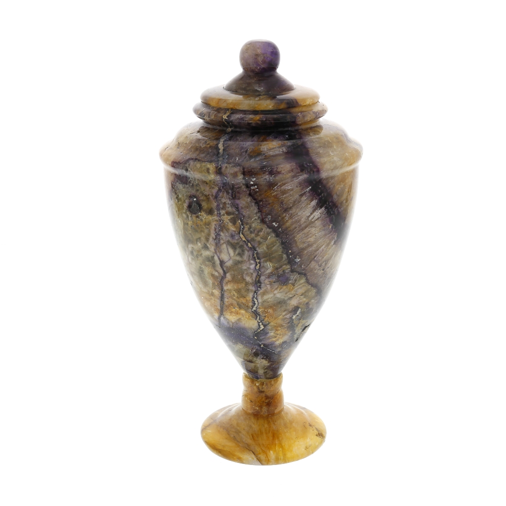 A Blue John urn. Winnats One Vein Of neoclassical ovoid form, the stepped fixed cover with ball