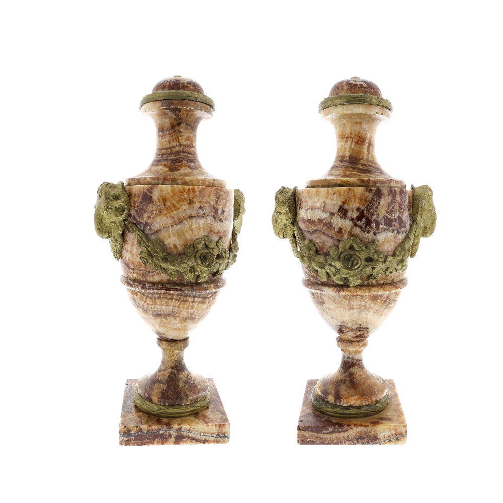 A pair of 19th century Derbyshire Spar urns. Probably 'Duke's Red,' Chatsworth Estate In the