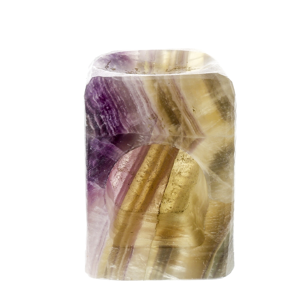 A fluorite incense/oil burner or night light The canted cuboid body with dished top over candle