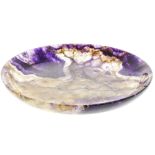 A Blue John saucer dish. New Cavern Vein Of circular form with attractive dark amethyst patches,