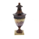 A 19th century Blue John urn. Blue John Cavern vein group Of neoclassical ovoid form with ball