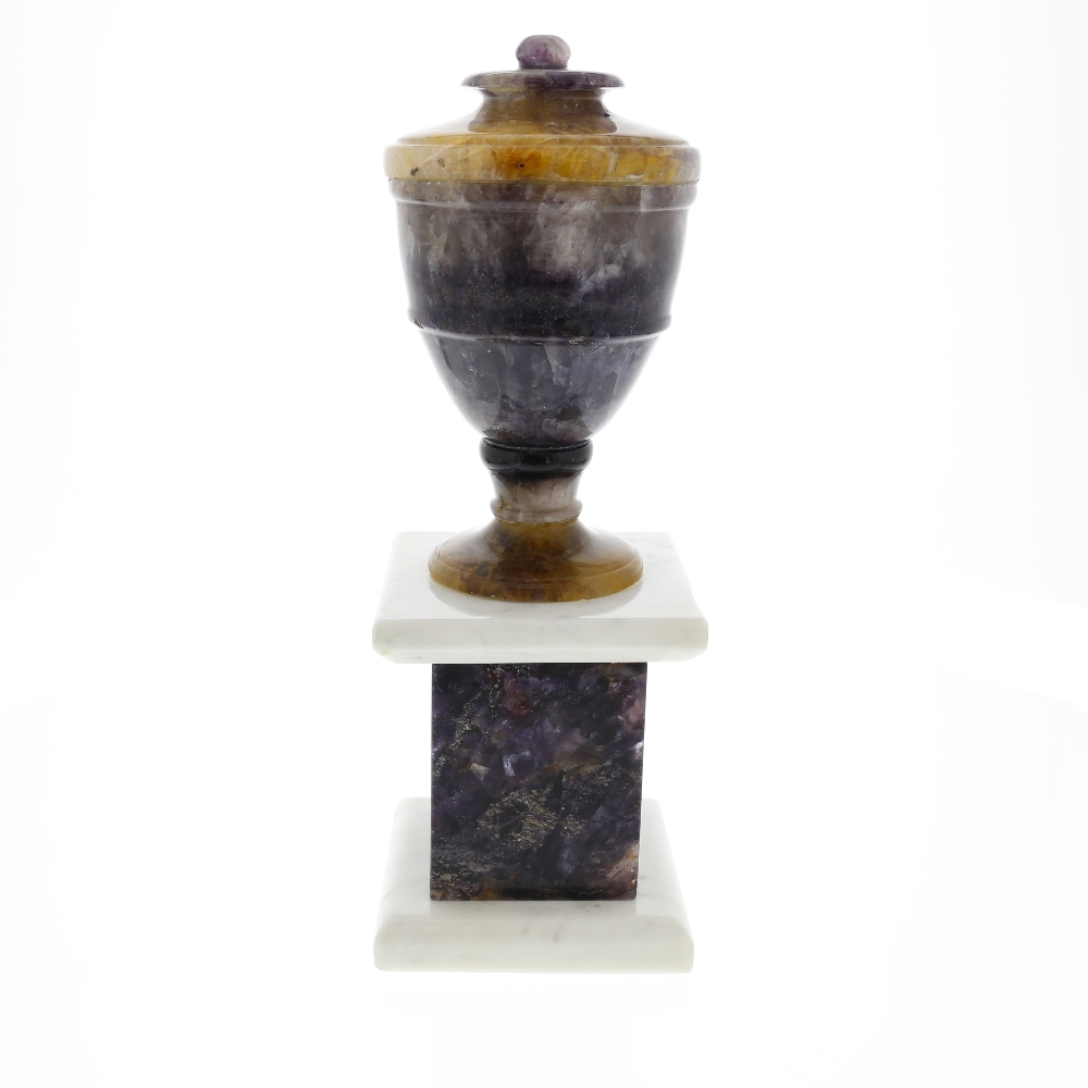 A Blue John pedestal urn. Treak Cliff Blue Vein The neoclassical ovoid body with ball finial and