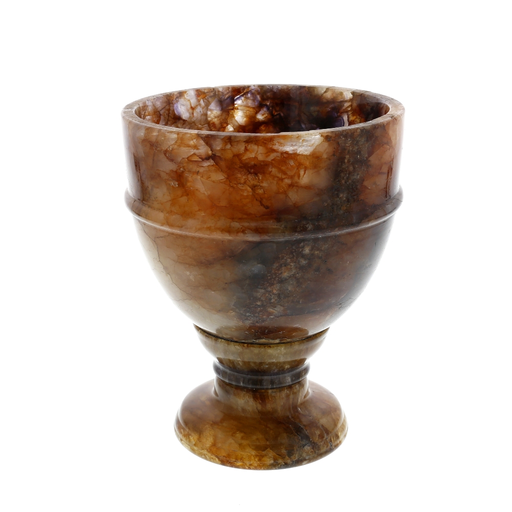A Derbyshire fluorspar chalice The rounded funnel bowl with ribbed collar on a tapering socle and